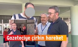 Okul görevlisinden gazeteciye çirkin hareket